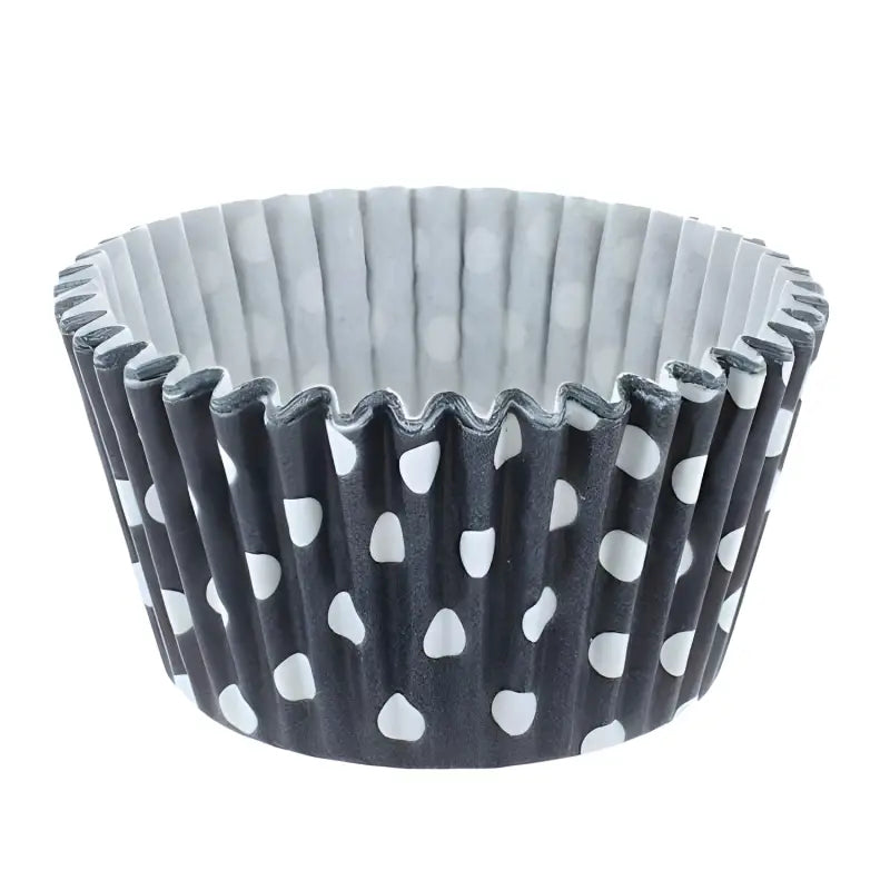 Polka dot cupcake cases on black background, ideal deli supplies cupcake decoration