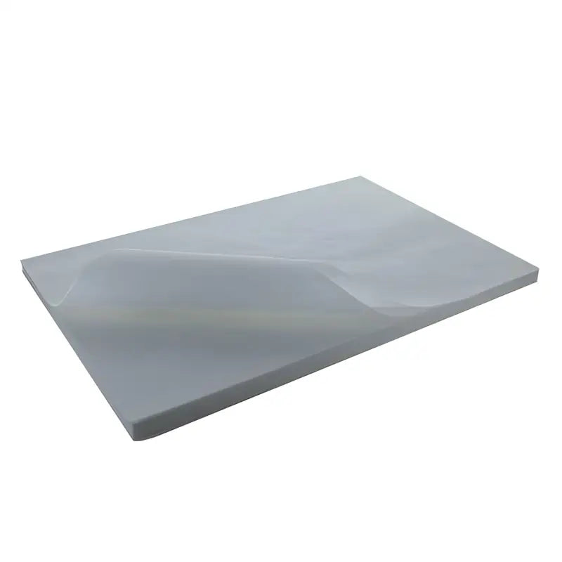 Rectangular gray foam mattress with indentation, ideal for Greaseproof Paper UK 450x700mm