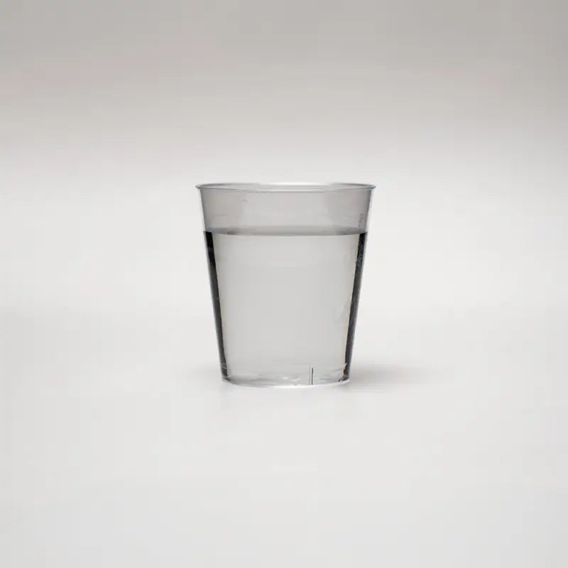 Clear plastic cup with water showcasing 2cl plastic shot glasses for accurate servings
