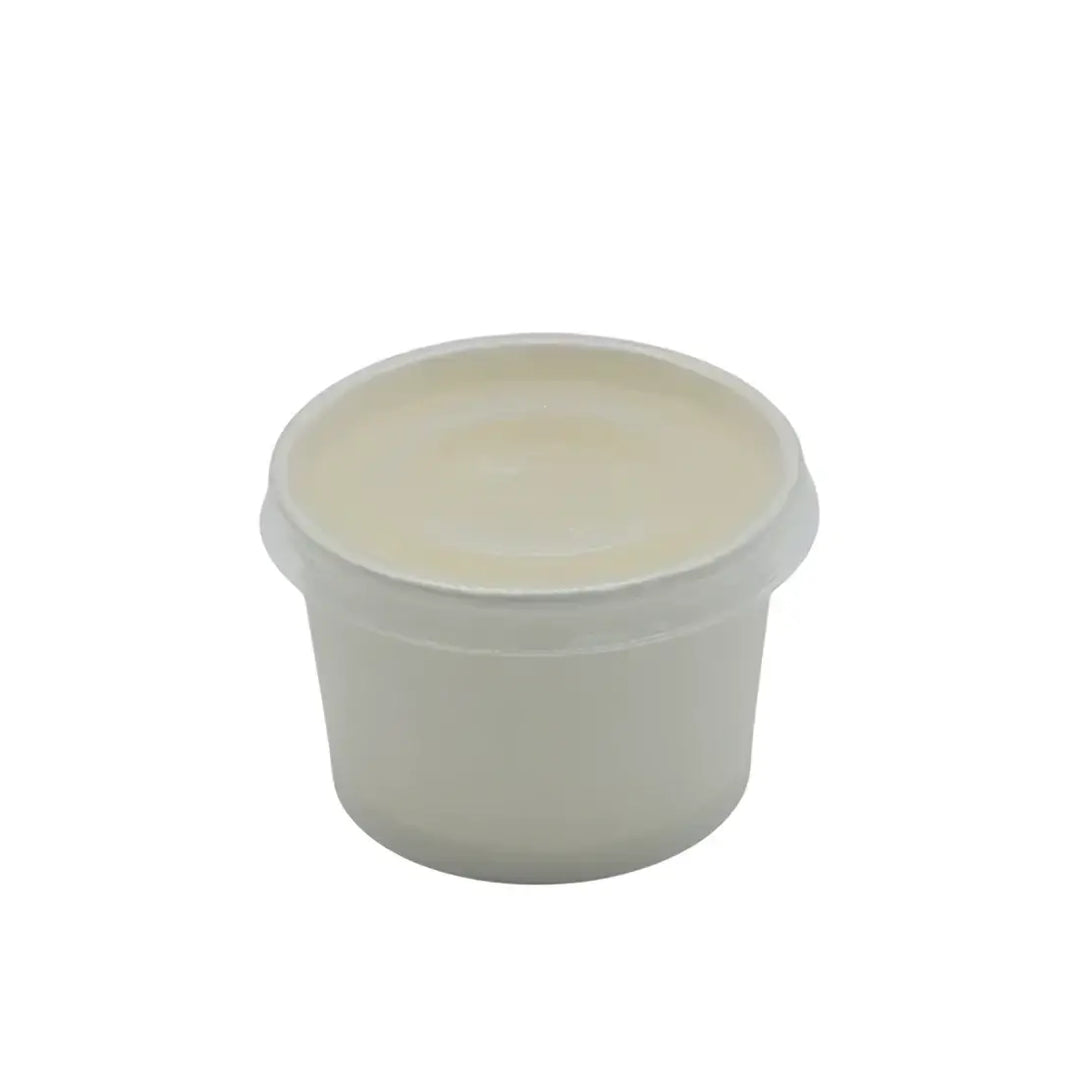 A translucent white plastic 4oz portion pot with a matching pp vented lid for food or cosmetics storage