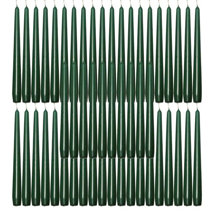 Dark green taper candles in rows for elegant dinner table decor