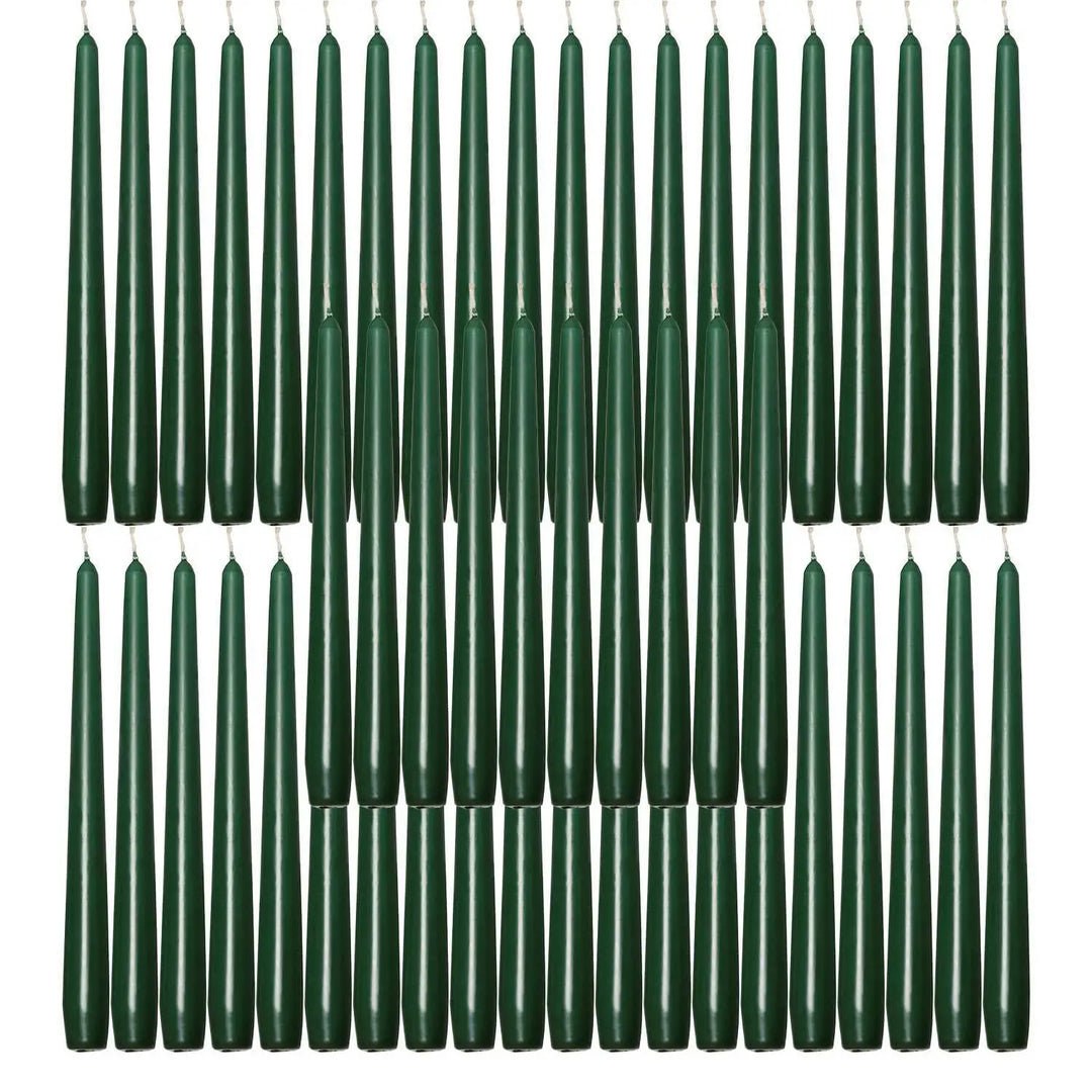 Dark green taper candles in rows for elegant dinner table decor