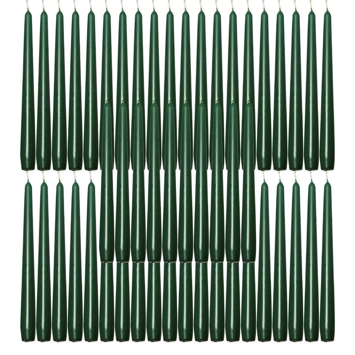Dark green taper candles in rows for elegant dinner table decor