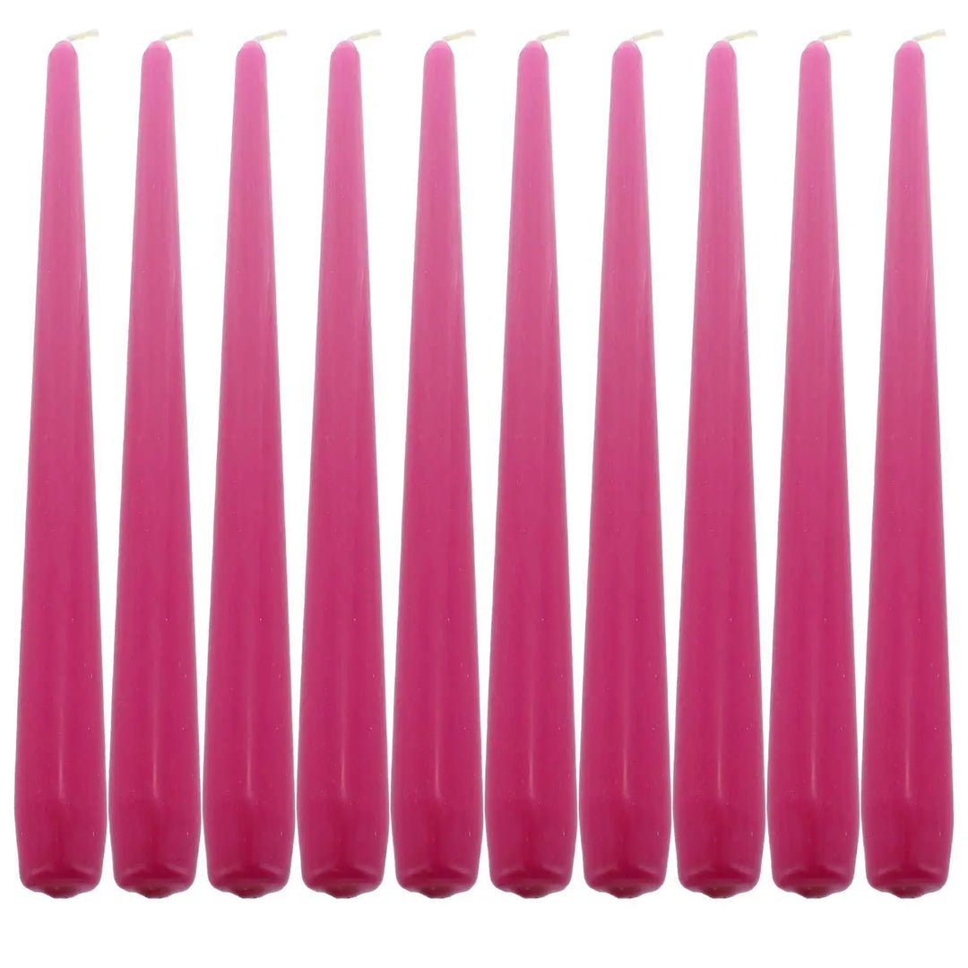 Row of tall pink taper dinner candles for elegant table settings and ambiance