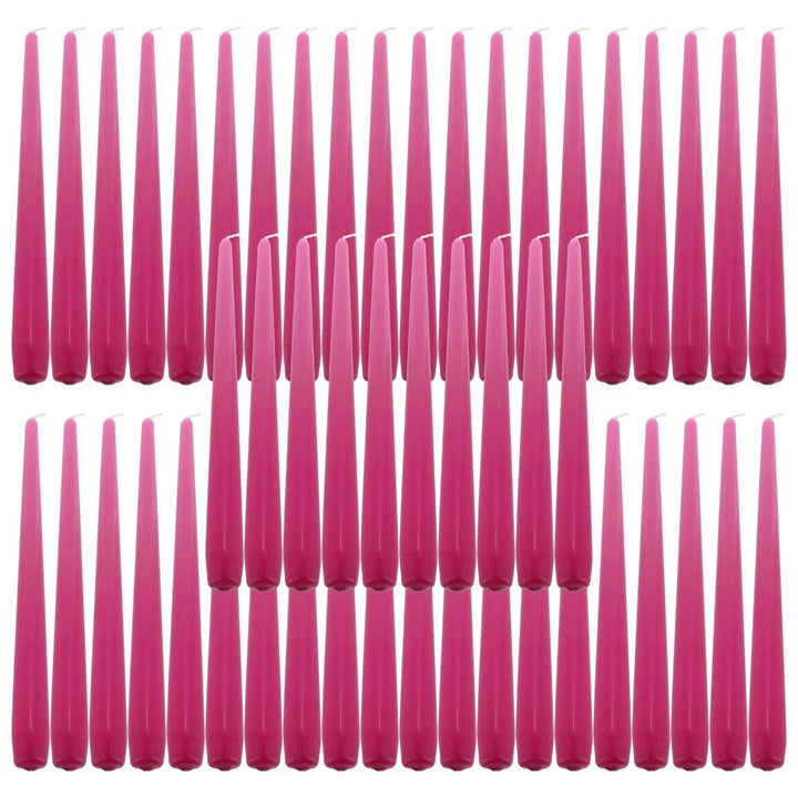 Pink taper dinner candles arranged in rows, perfect for elegant table settings