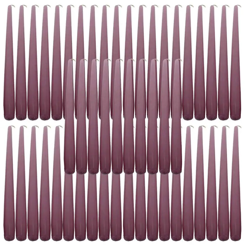 Rows of mauve taper dinner candles in a grid pattern, perfect for elegant dining