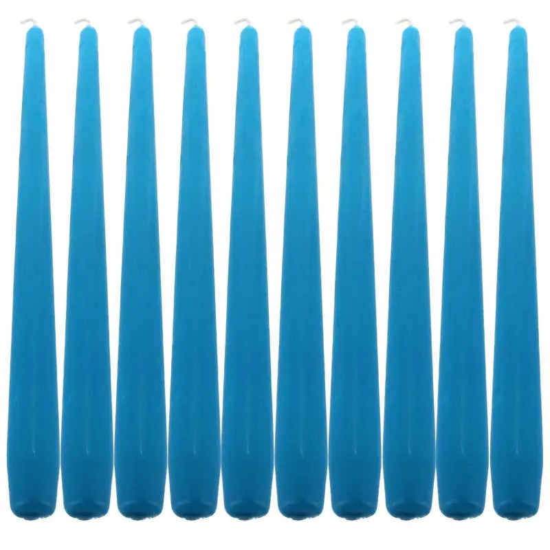 Ten blue taper dinner candles arranged in a row for elegant dining ambiance