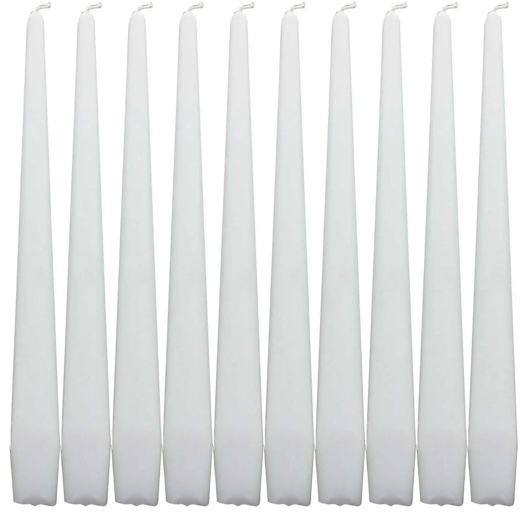 Set of white taper dinner candles arranged in a row for elegant dining decor
