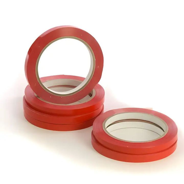 Red adhesive tape rolls stacked, ideal for 9mm x 66m vinyl tape and neck sealer applications