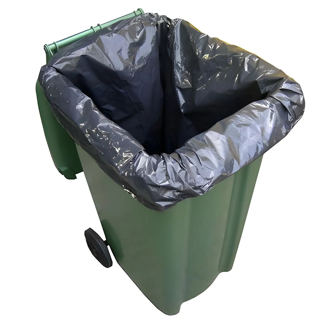 Green wheeled garbage bin with black plastic liner, ideal for black wheelie bin liners