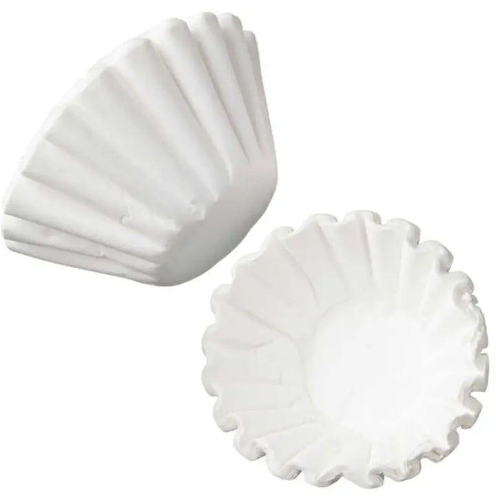 Coffee filters arranged in flat and folded shapes for filter coffee machines