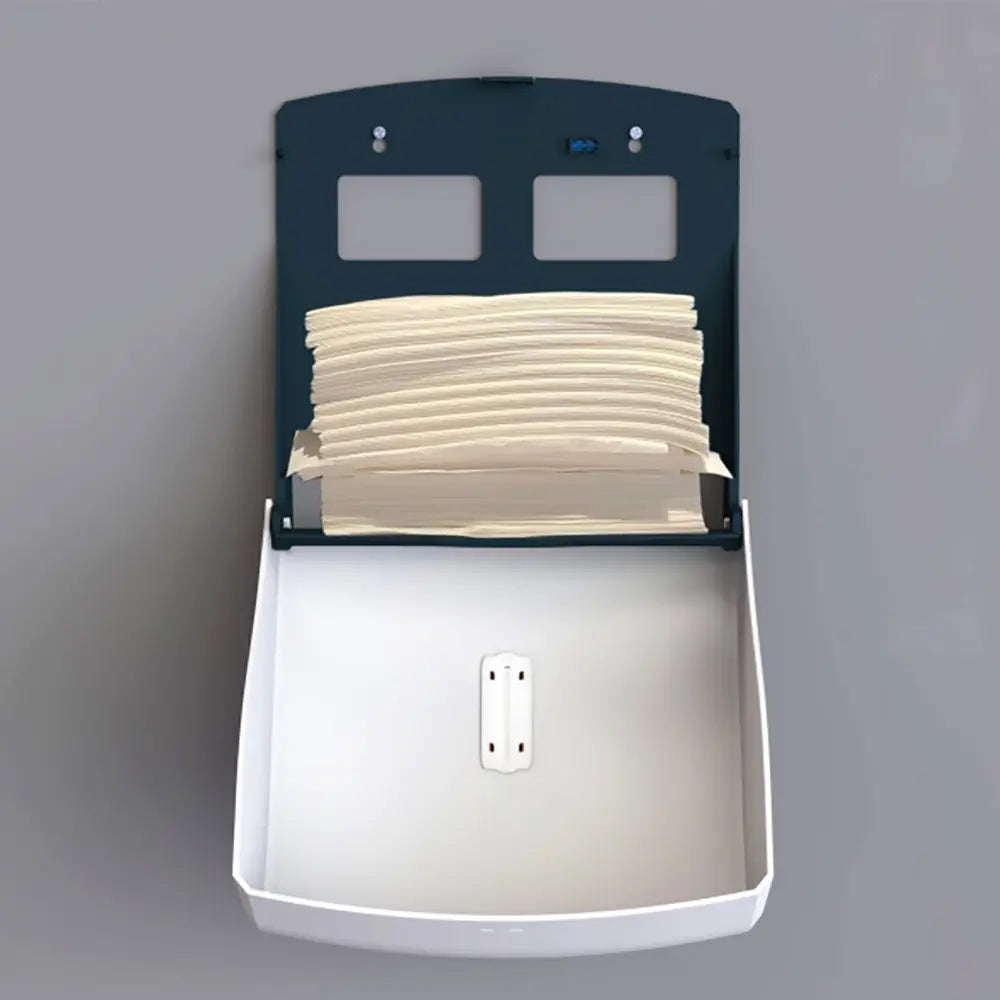 White and dark green wall-mounted deli supplies halo hand towel dispenser with beige folded paper towels for deli use