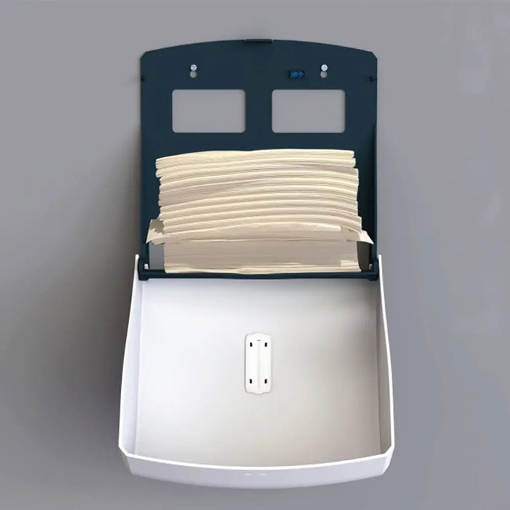White and dark green wall-mounted deli supplies halo hand towel dispenser with beige folded paper towels for deli use