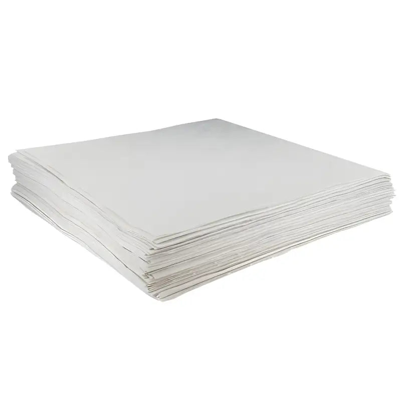 Stack of white paper sheets for disposable paper tablecloths and table covering