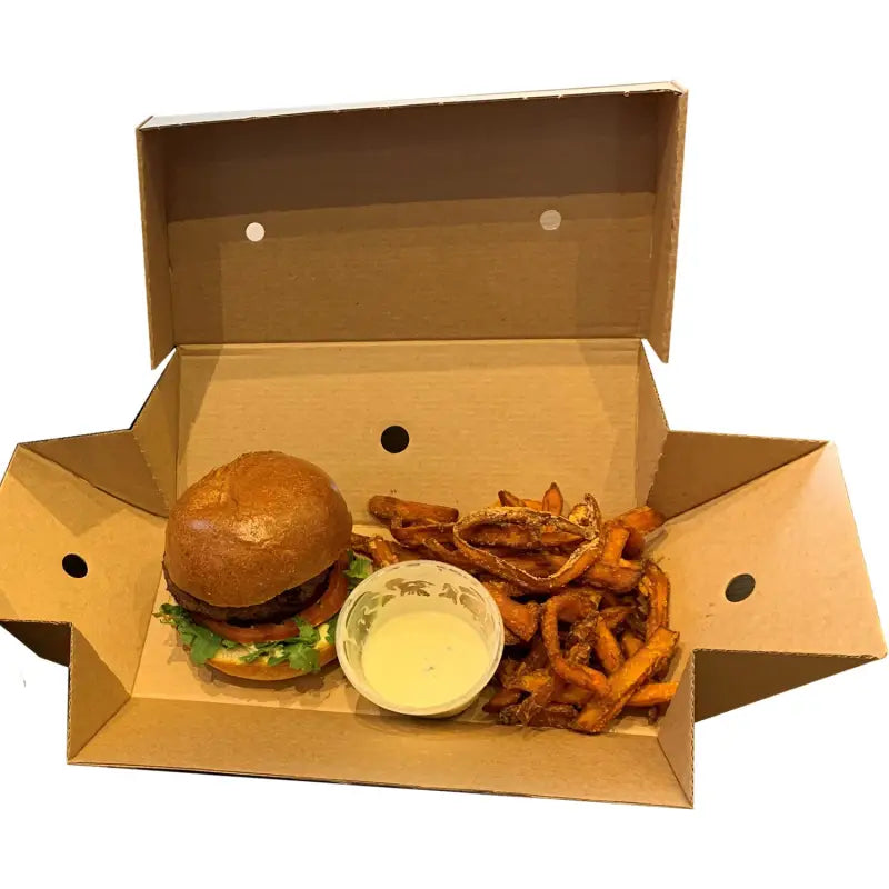 Burger and fries in a Gourmet Kraft biodegradable burger box for eco-friendly dining
