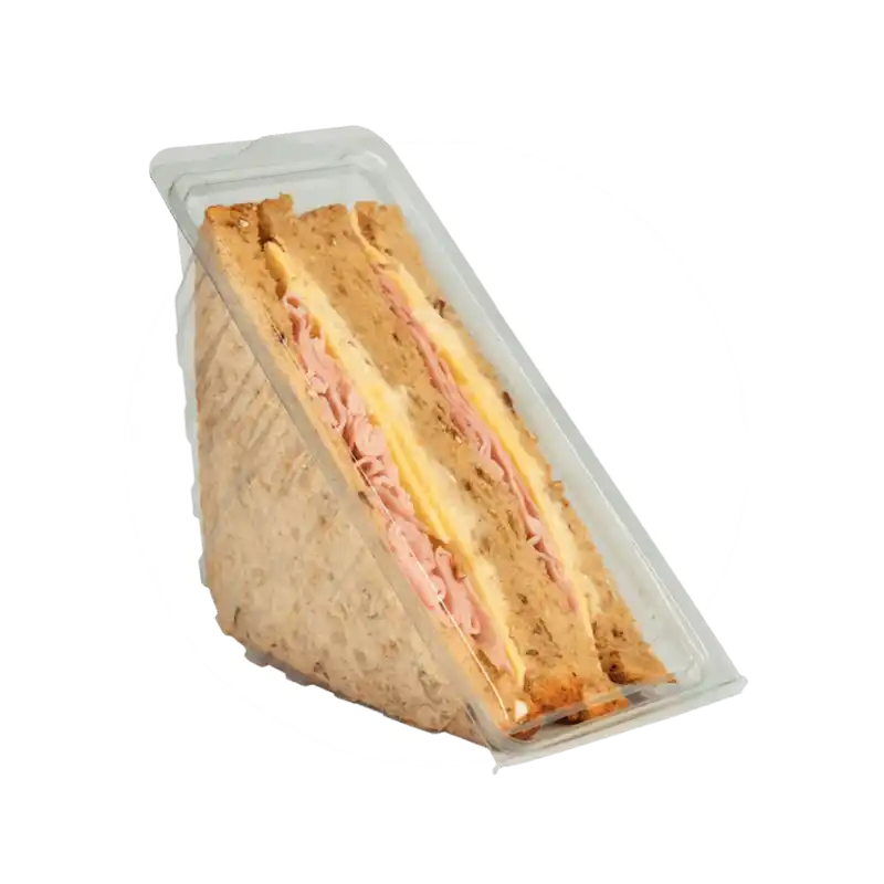 Ham and cheese sandwich in a clear plastic container.