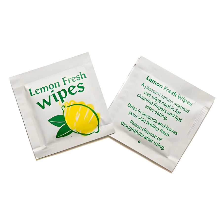 Lemon scented disposable wet wipes in individual packets from Lemon Scented Hand Wipes UK
