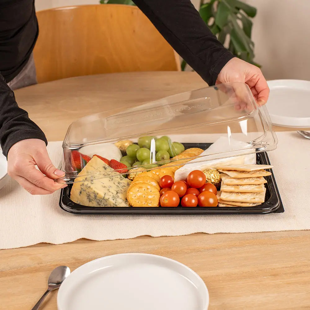 Black plastic ultimate medium sandwich platter with clear lid featuring unique press stud secure closing lid holding cheeses and crackers
