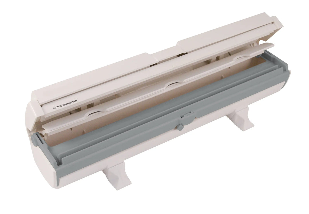 Beige and gray plastic wrapmaster 1000 dispenser with sliding mechanism that 63m10 takes film and foil refills