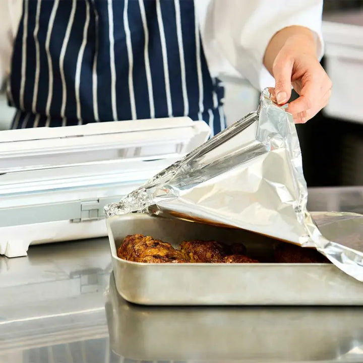 Baking dish covered with Aluminium Foil 24C54 from Wrapmaster 3000 for food preservation