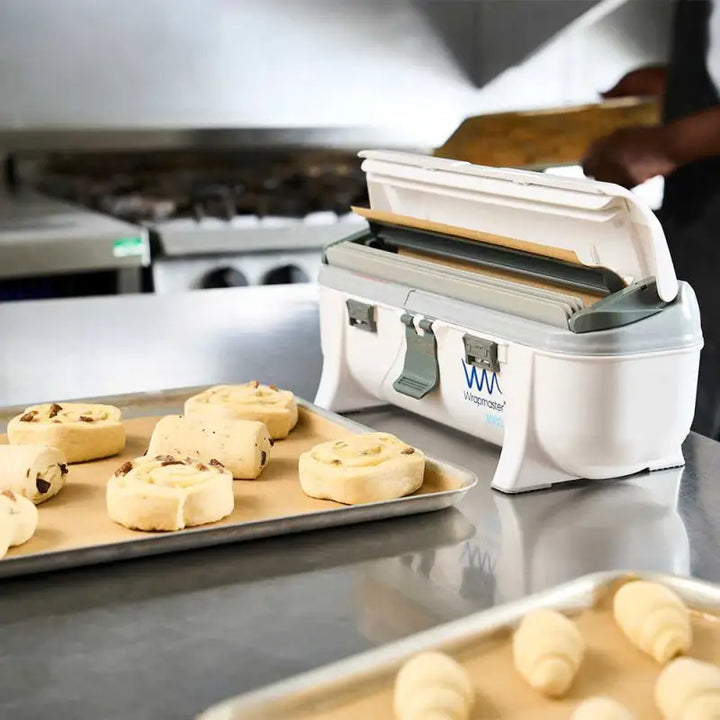 Countertop electric food slicer with cookies and Wrapmaster 3000 Dispenser - 63M98 Takes Film