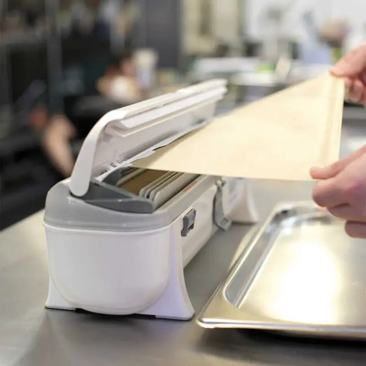 Pasta maker feeding dough shows use with Wrapmaster 4500 Dispenser - 63M97 refill rolls